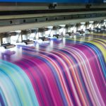 Large inkjet printer working multicolor on vinyl banner